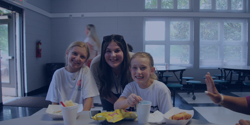 Maddy Walker, Laci Thompson, and Allie Coles at the back to school picnic